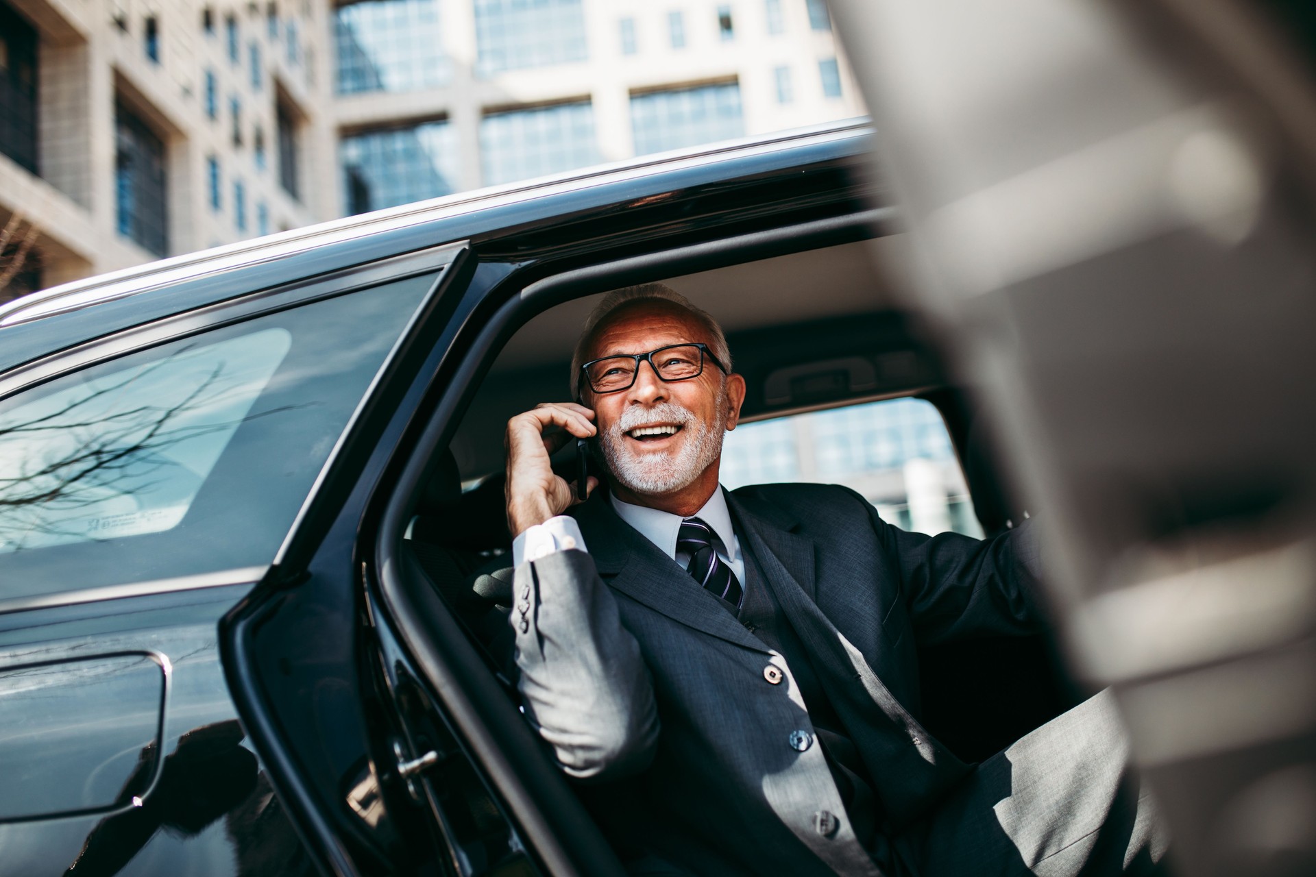 Senior business man in car